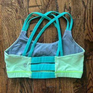 Born Primitive Neon green and blue sports bra